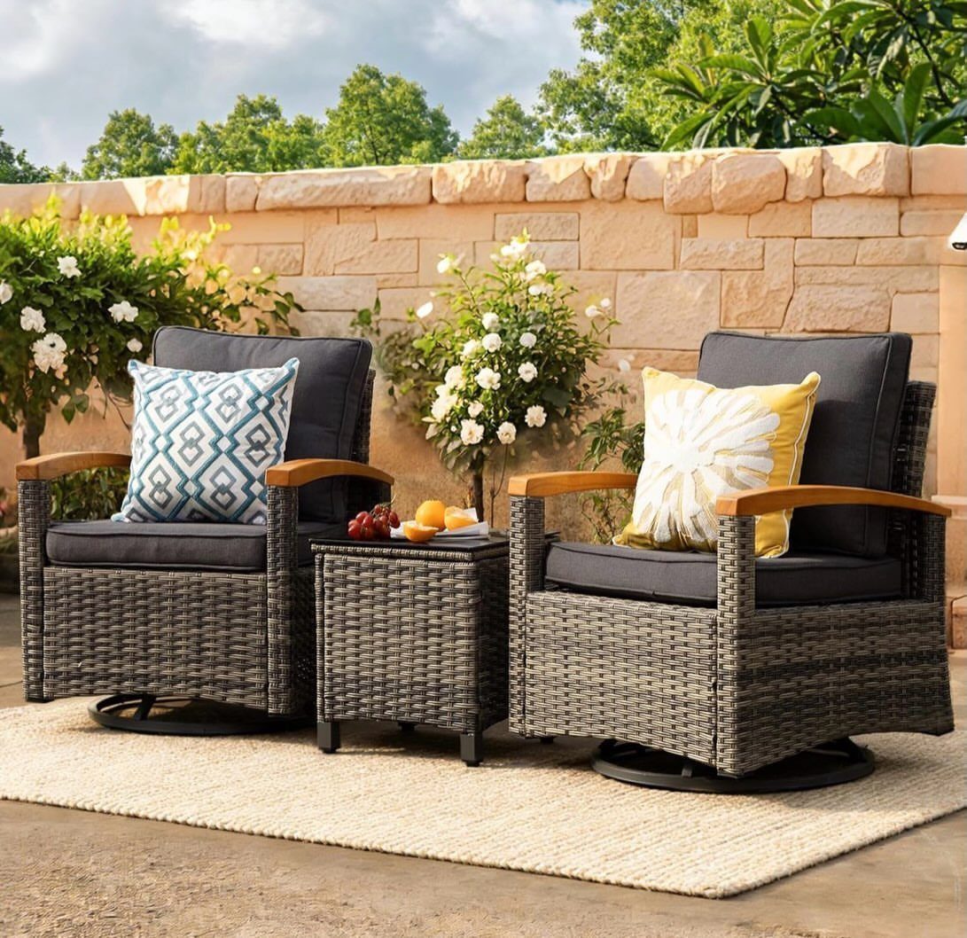 12 Deck Furniture Ideas: Layouts for Seating, Dining & Entertaining 11 Two grey wicker swivel chairs with decorative pillows and a small side table on a rug.